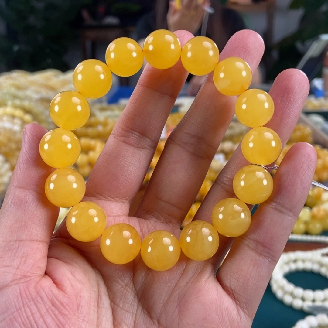 琥珀未镶嵌珠宝奇石13鸡油红圆珠20.84