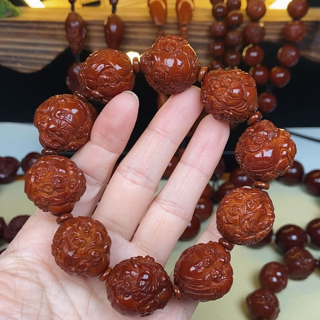 橄榄核吊坠厚**物百子财神