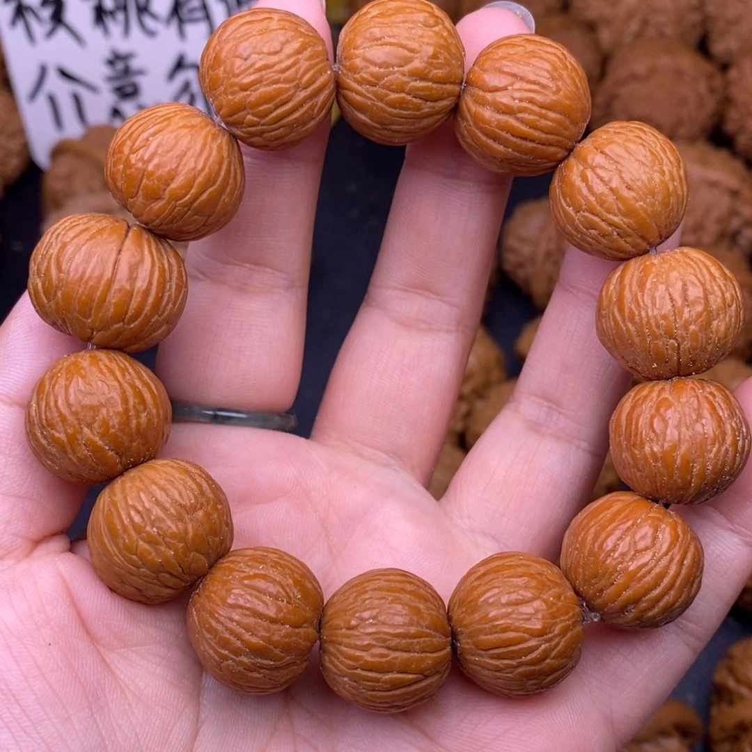 文玩核桃把件凤羽猴头手串1.8