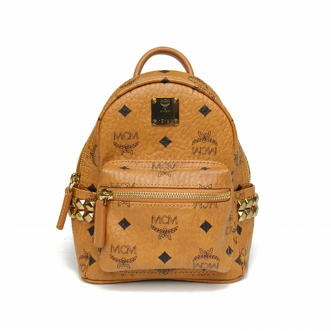 95新 MCM 【娇】侧边铆钉 双肩包 MINI 干邑色 皮革C 129997