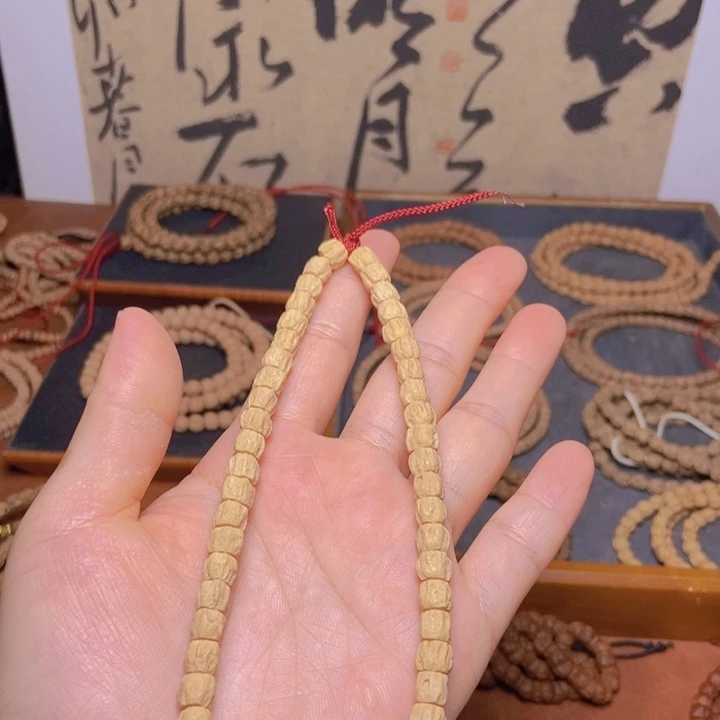 柏香籽/百香籽吊坠手持