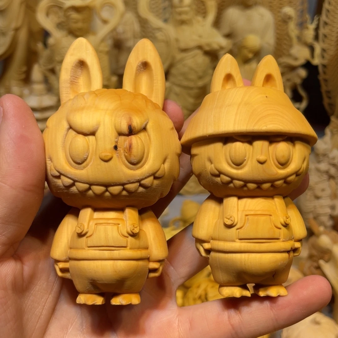 世***雕黄杨木瑕疵拉布布一对