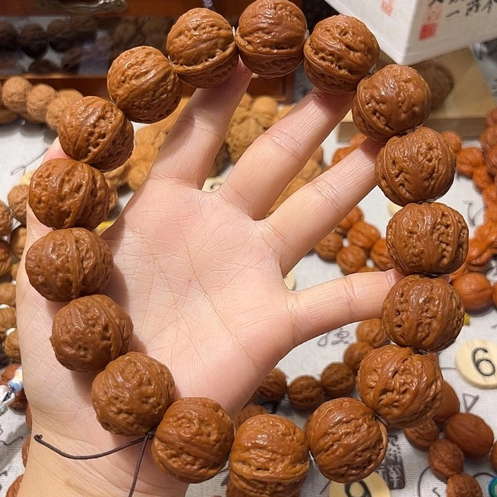 老***路桃核吊坠粗筋八棱元宝