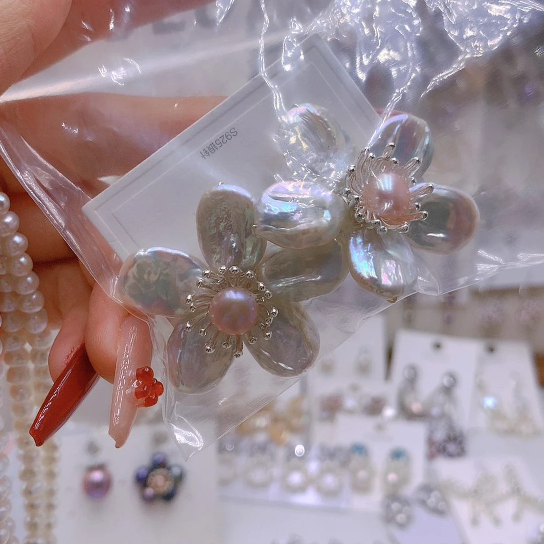 银S925镶嵌耳饰淡水珍珠万**意