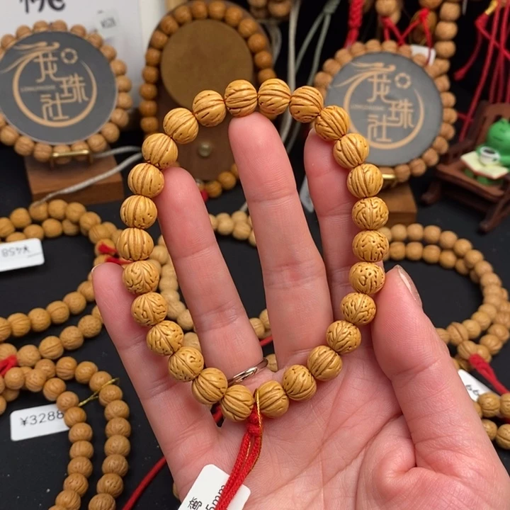 福***余桃核手串凤鸾边尺10.5抛光26颗尺寸误差0.5mm之间