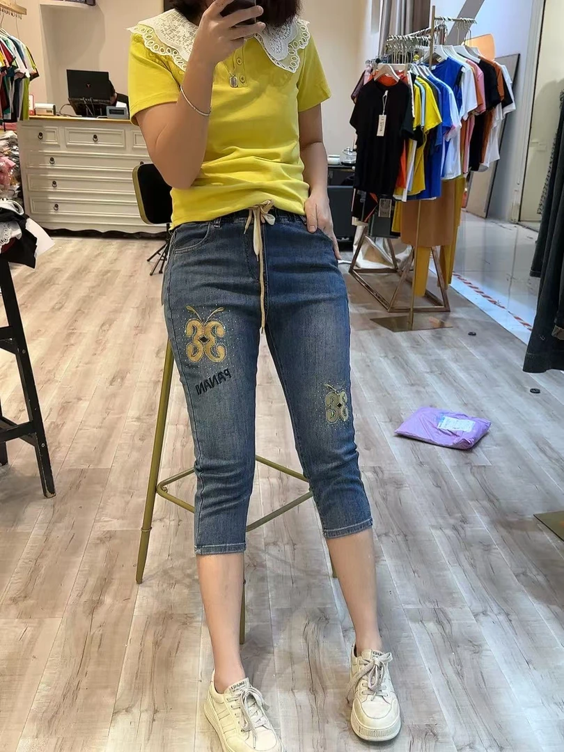 时尚潮流百搭休闲松紧哈伦7分薄款弹力牛仔裤9730