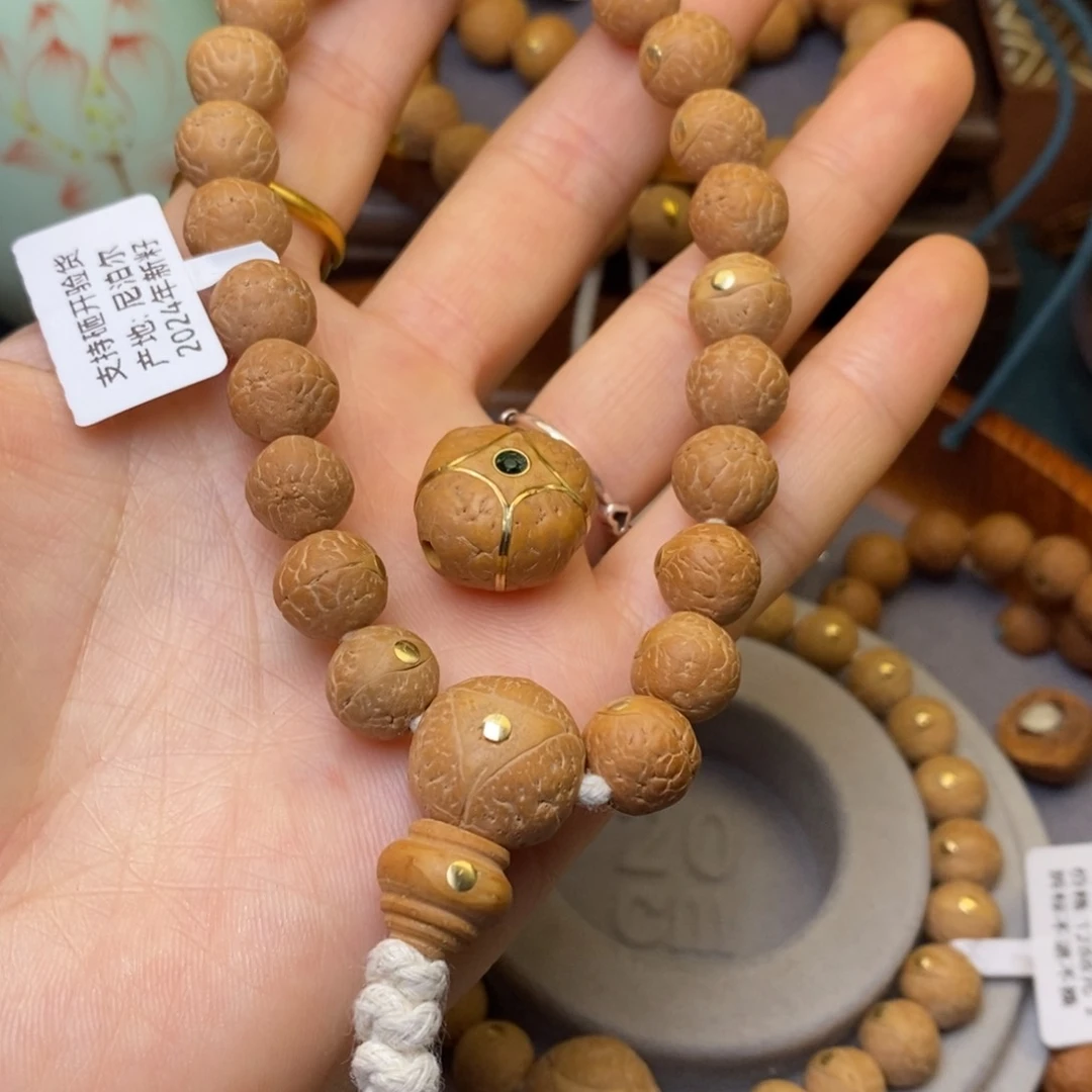凤眼菩提手串雪****鹰10.5➕铜，镶嵌麒麟