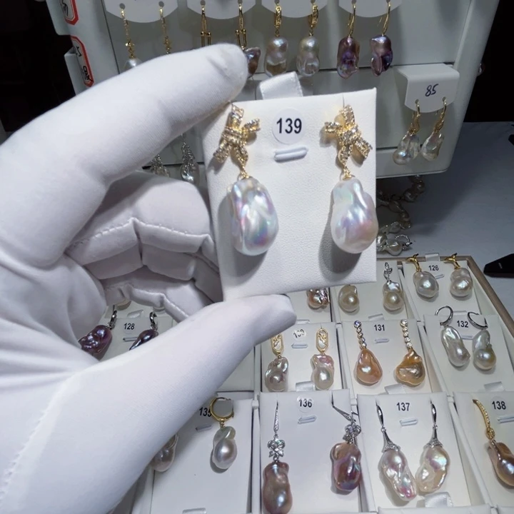 淡水珍珠耳饰银S925镶嵌菩***?