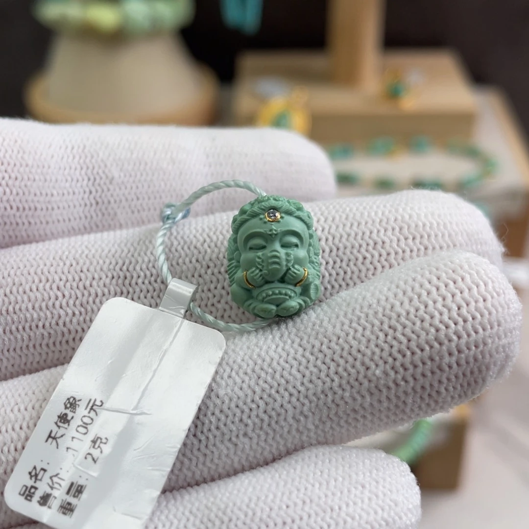 绿松石未镶嵌高瓷绿天使象
