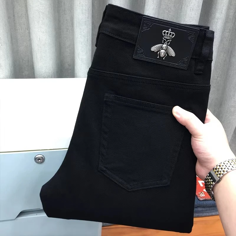 CQV小蜜蜂高端黑色牛仔裤男弹力修身小脚长裤大码宽松直筒秋冬款