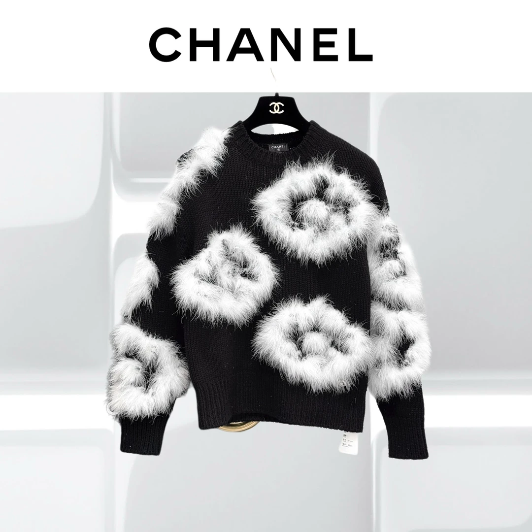 99新 Chanel/香奈儿 36码23K黑白山茶花羽毛针织上衣