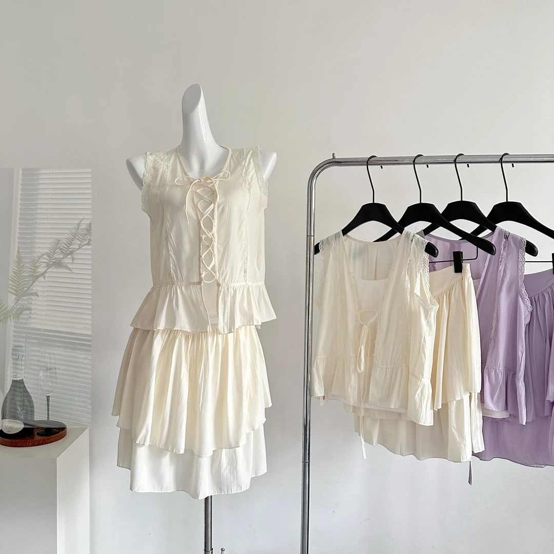 诺丁山白桥压褶韩系套装系带背心修身显瘦洋气不规则短裙半身裙