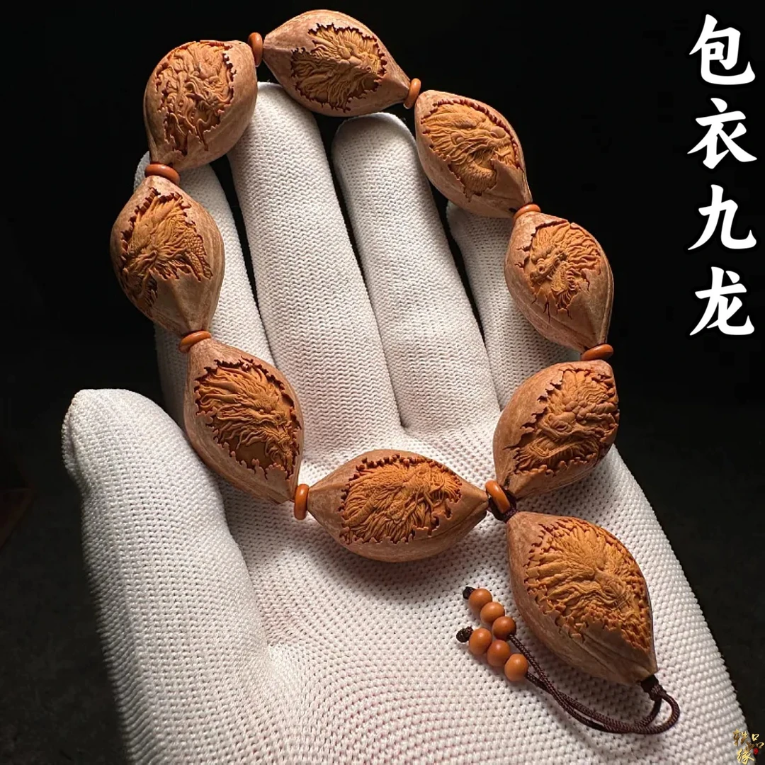 浮雕包衣九龙橄榄核手串男款高级感高端核雕手工雕刻龙头男士手持