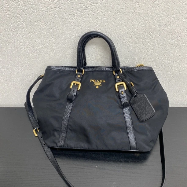 95新 Prada/普拉达 黑金降落伞拼皮托特手提斜挎包底长27 123778
