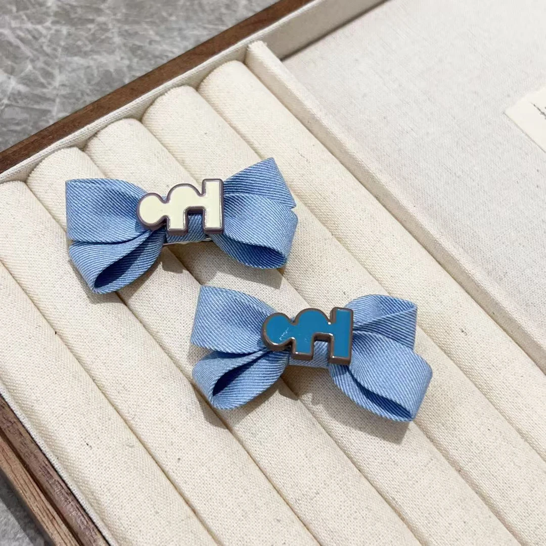 时尚牛仔蝴蝶结侧边夹J1424