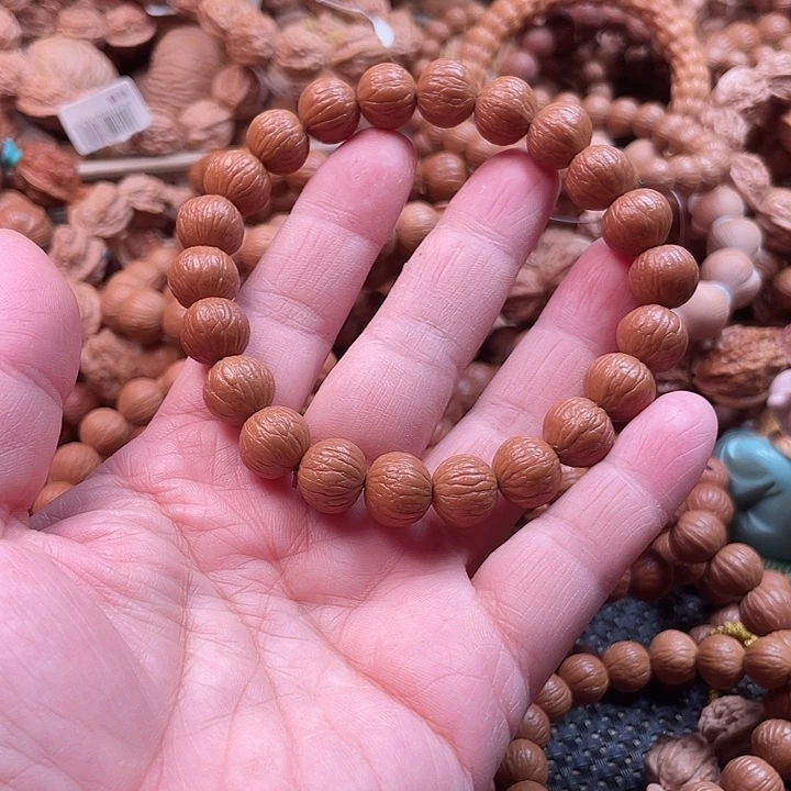 手串猴头核桃1.1+同尺磨盘风羽