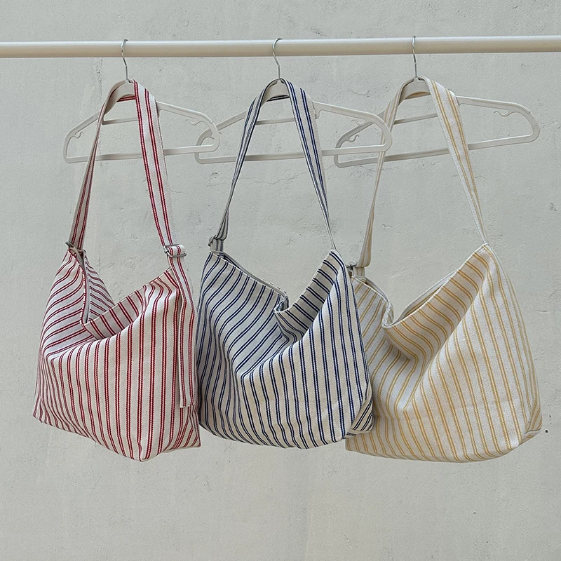 韩版ins风条纹帆布包女2025新款时尚百搭大容量单肩斜跨包包