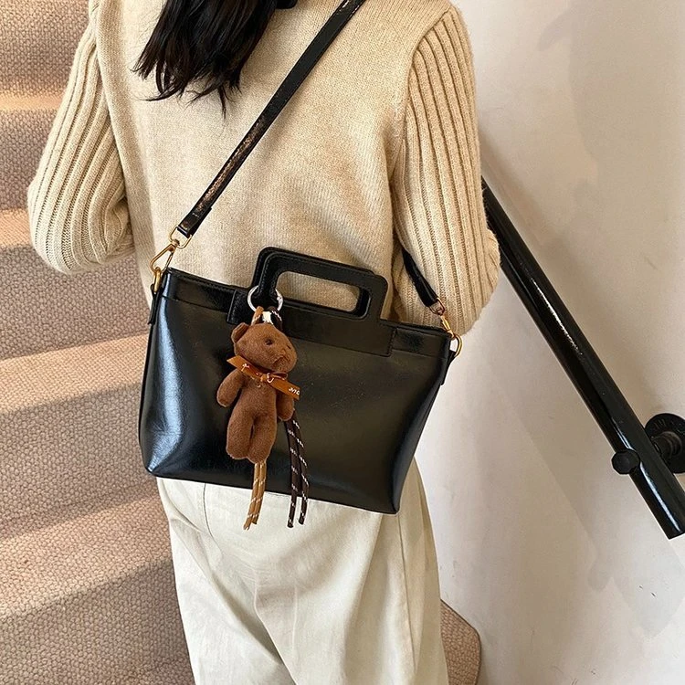 [按照编码31-50下单]女生简单黑色单肩手提包