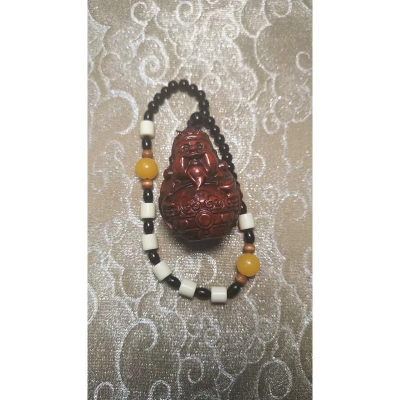 ZJ140 紫檀把件（来财）