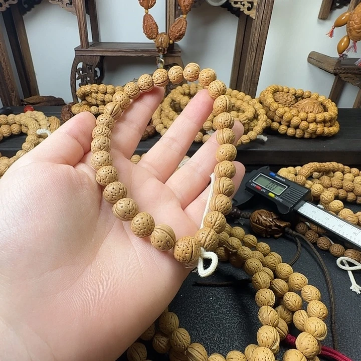 9***7吊坠桃核桃核手串