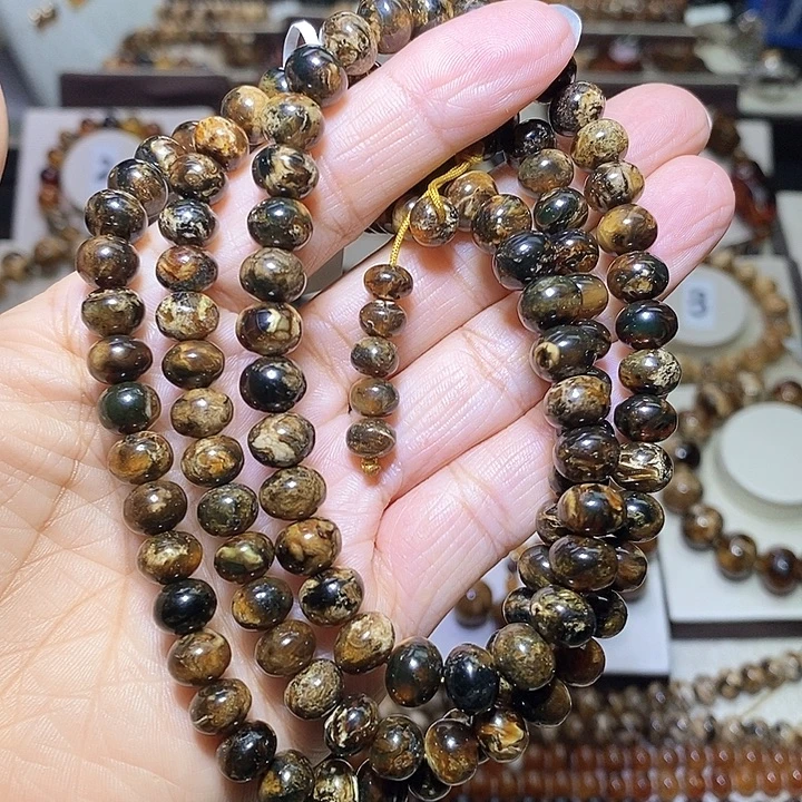 用***7琥珀未镶嵌裸石熊猫花8m