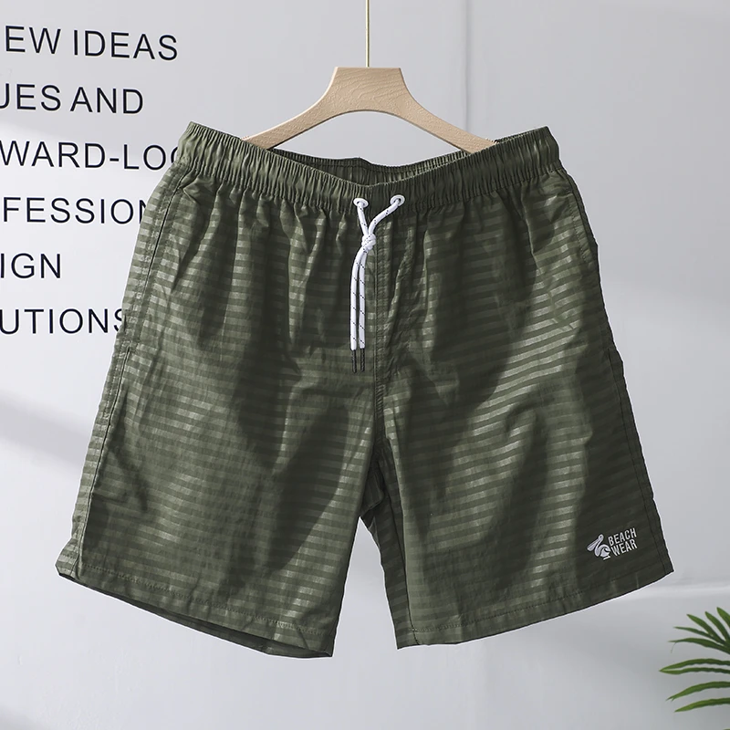 男士短裤夏季新款休闲条纹军绿色五分裤男款轻薄冰丝速干沙滩裤衩