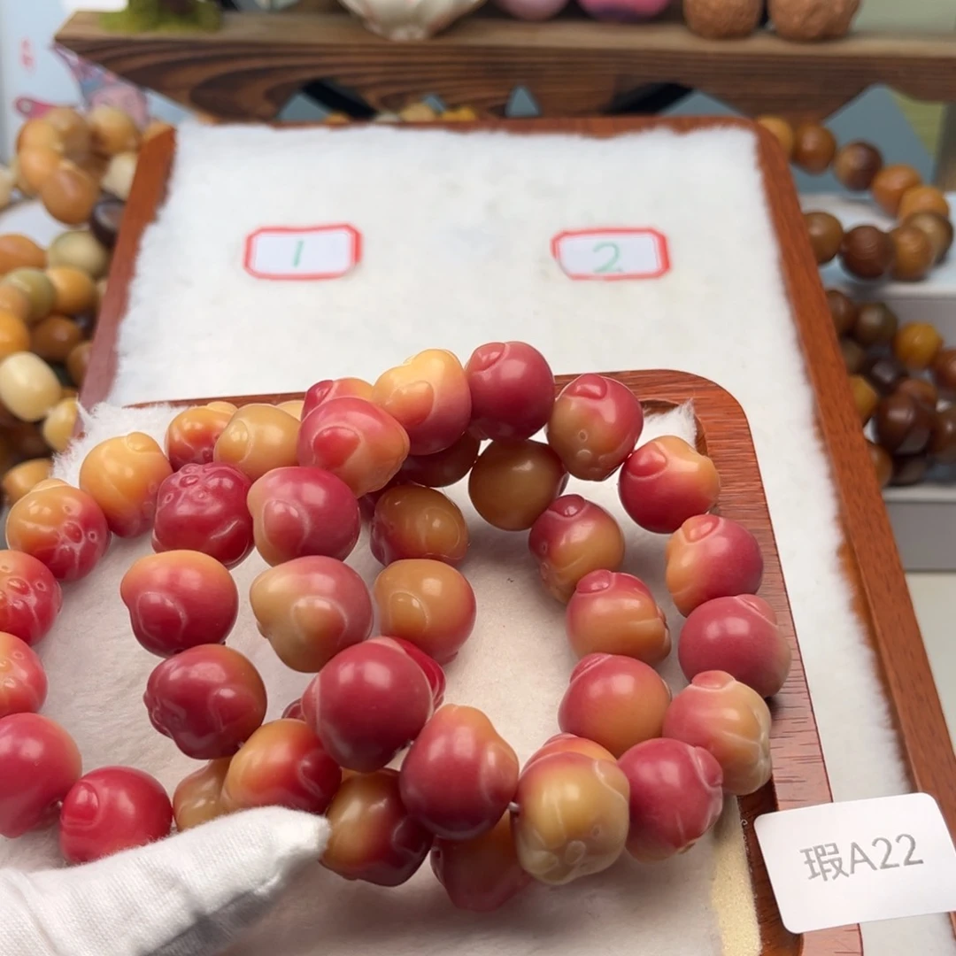 菩提根/象牙果手串17mm猪猪一串瑕A22