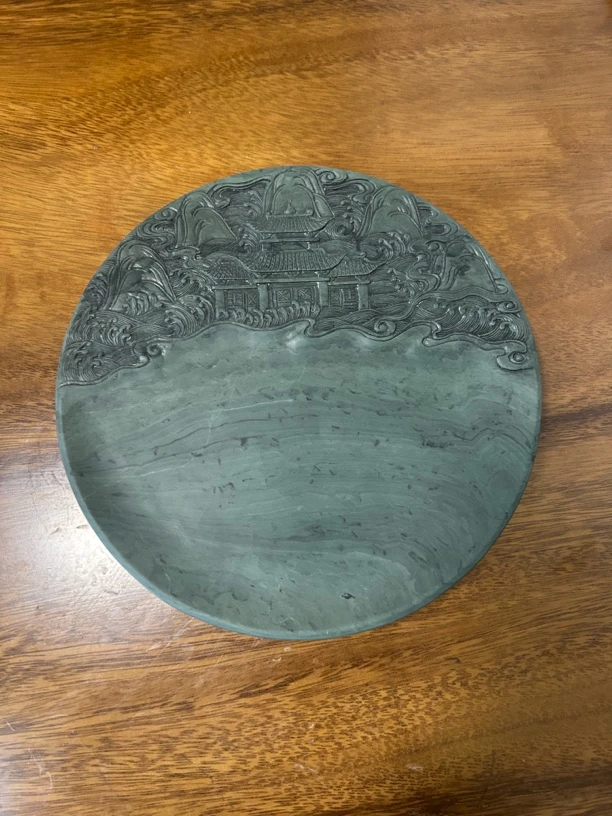 喇嘛崖老坑洮水流注纹，蓬莱海兽