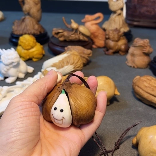 牧***马木鹿角大蒜手把件