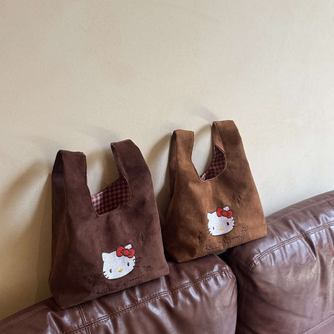 深浅棕麂皮绒手挽包：刺绣kitty可爱小容量手提包