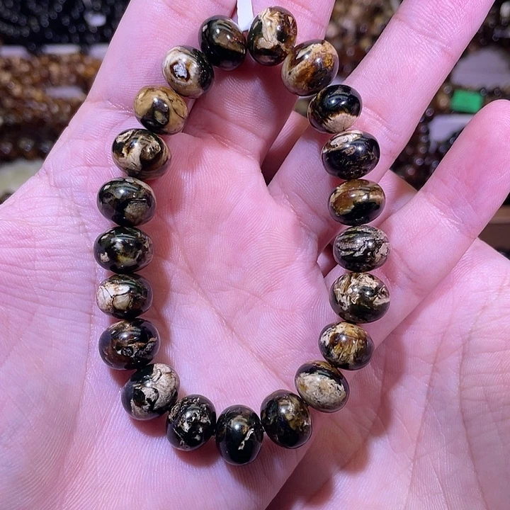 琥珀未镶嵌裸石11+抚顺琥珀黑花