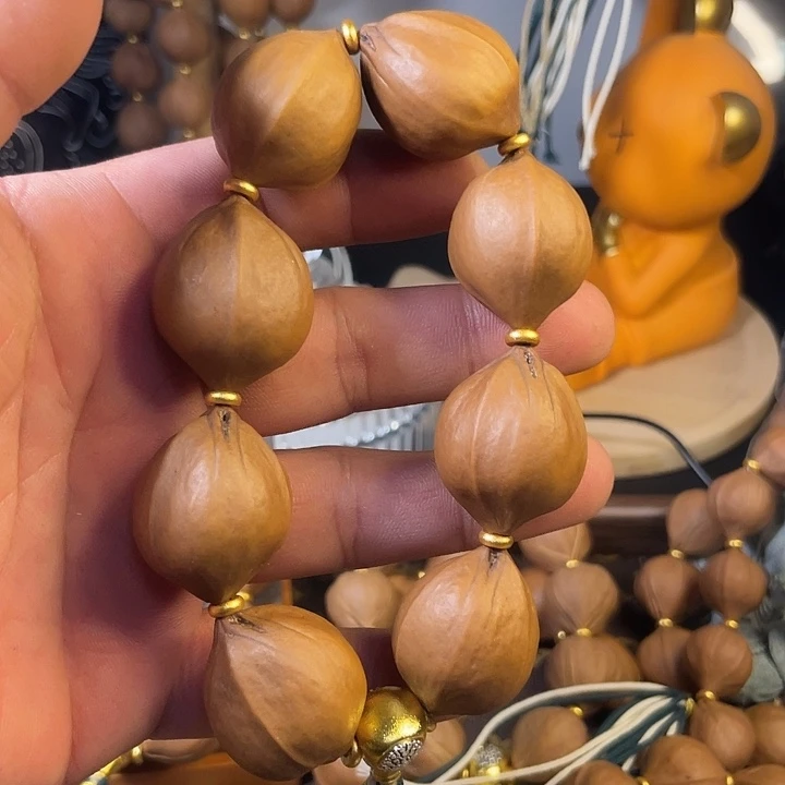 茗***)手串橄榄核梅林黄胖