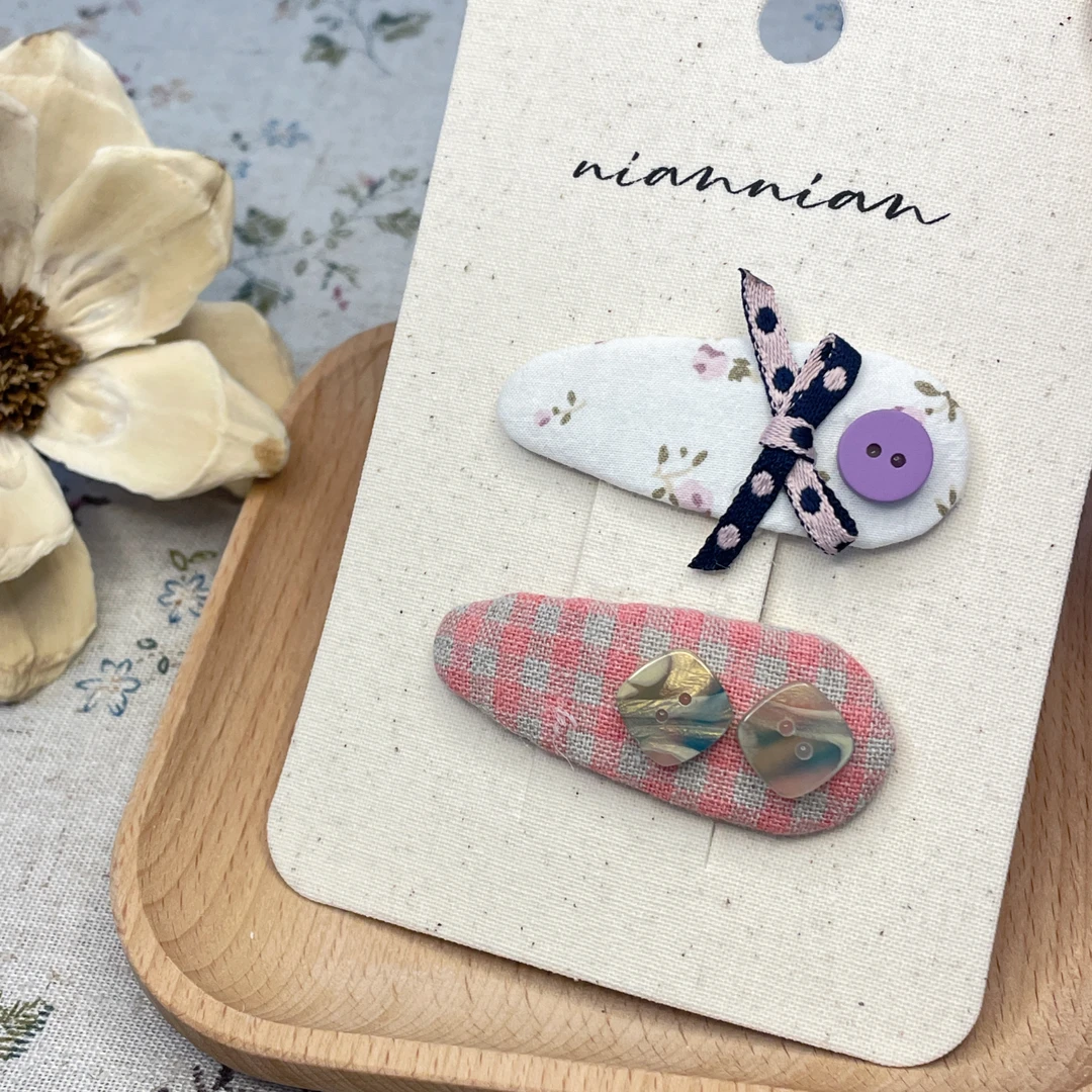 niannian韩版原创春夏新款甜美蝴蝶结碎花纽扣儿童发夹
