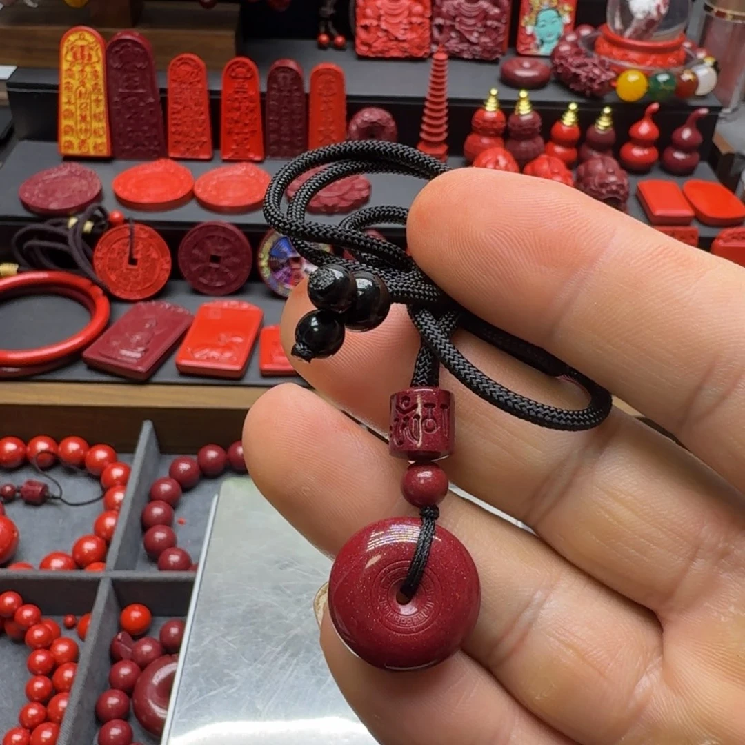 弥***紫天然辰砂保真高含量紫金砂小号回纹平安扣吊坠
