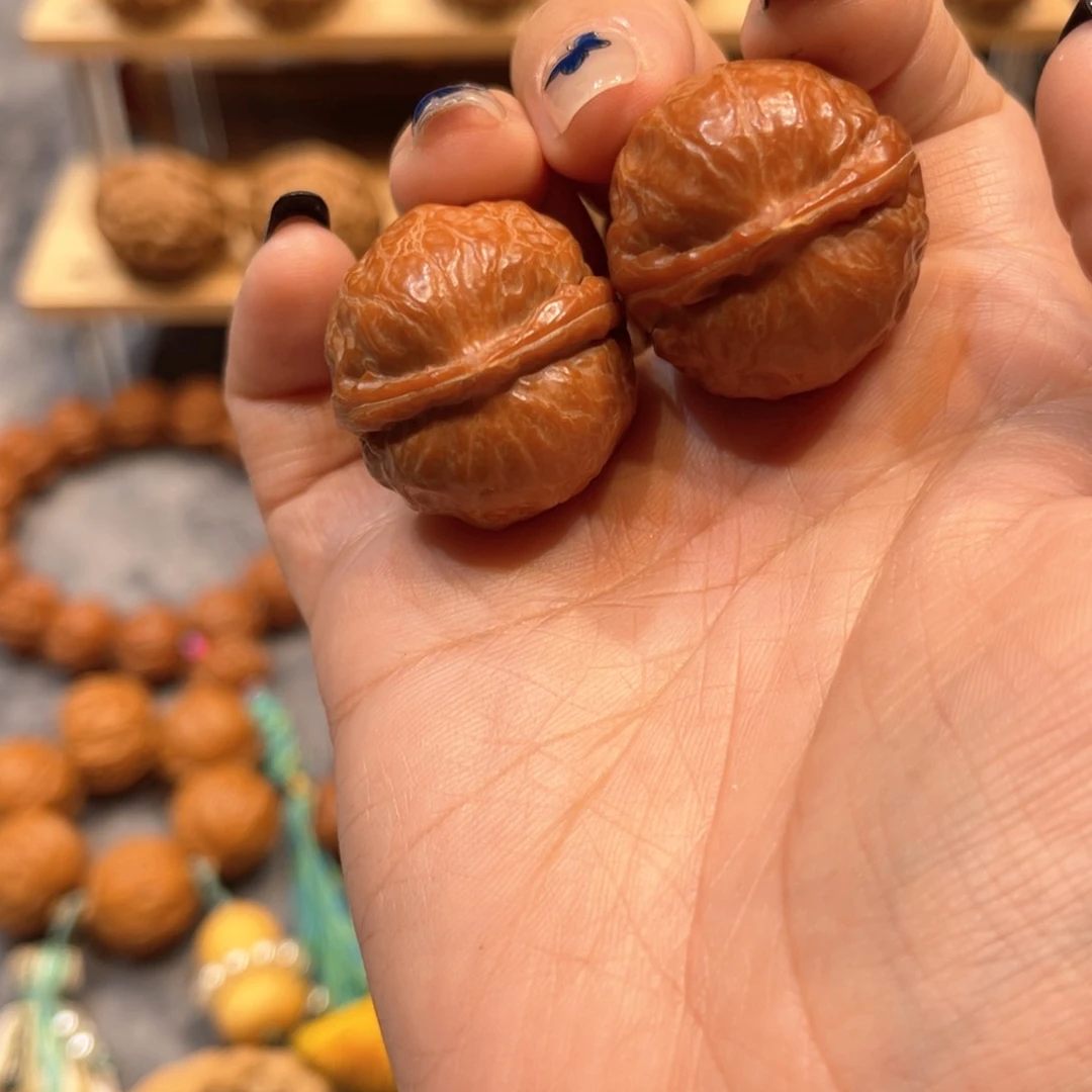 文玩核桃把件红皮大四喜