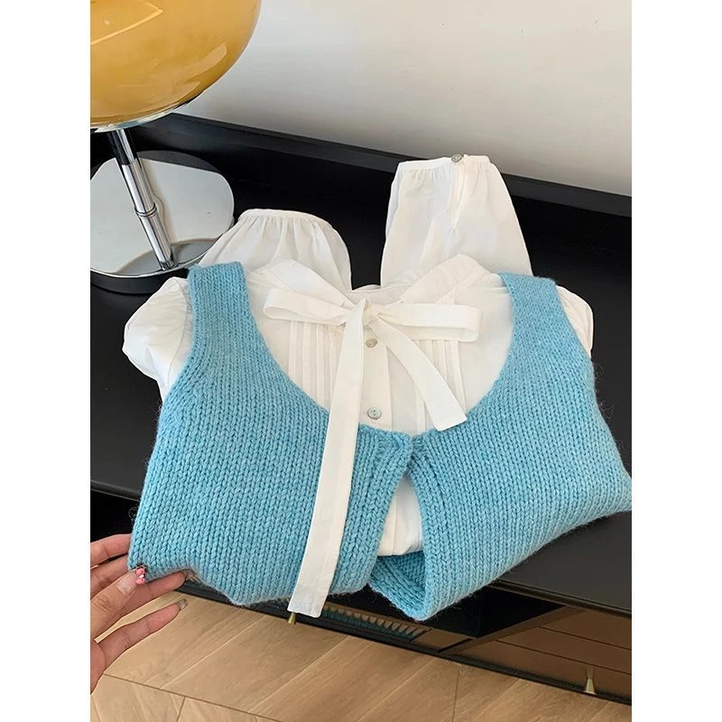 流行穿搭一整套女2025新款减龄宽松白色蝴蝶结衬衫针织马甲两件套