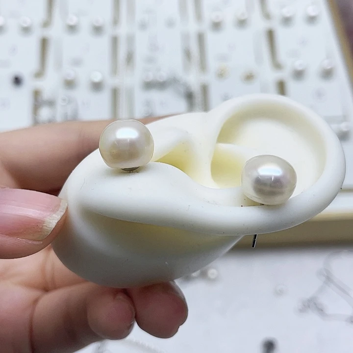 淡水珍珠耳饰银S925镶嵌欣***?