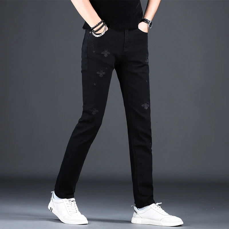 萨尔布勒斯破洞牛仔裤男士弹力休闲修身小脚韩版新款男士黑色长裤