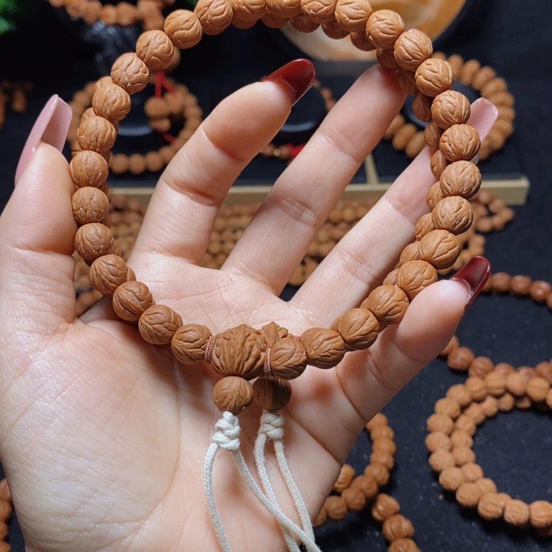 悟***悾桃核吊坠秦岭文玩