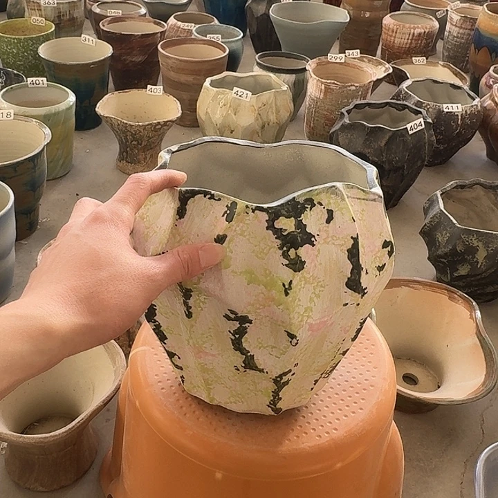 口16高22窄口13带孔一个