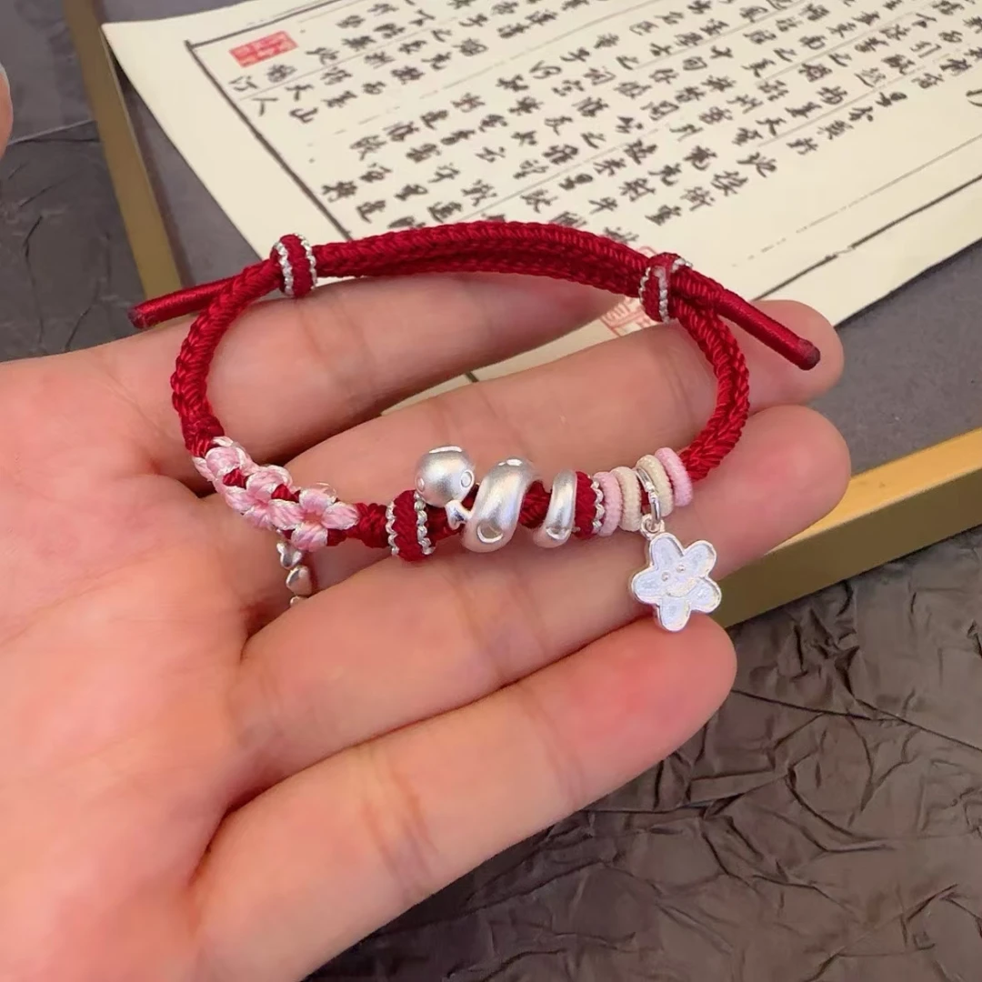 足银布艺手链 足银999卷卷蛇桃花编绳，星星款情侣生肖款式女朋友
