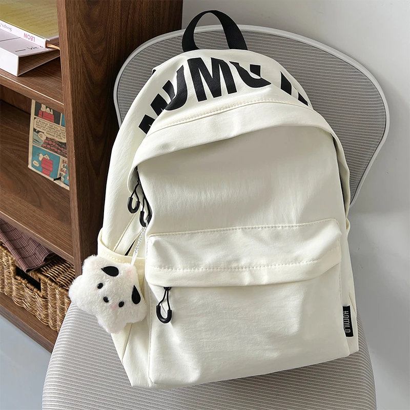 纯色书包ins初高中简约大学生旅行轻便大容量背包百搭校园双肩包