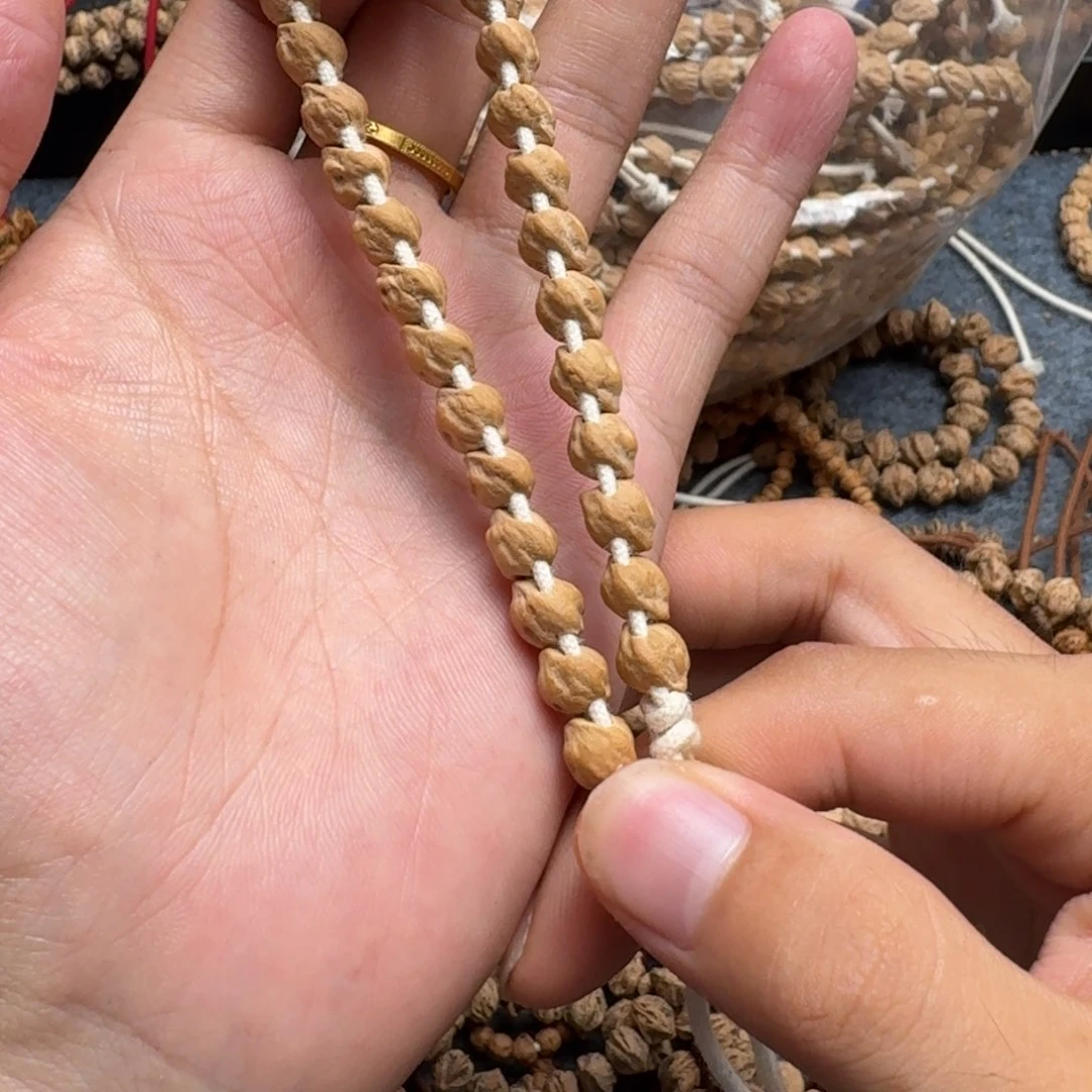 柏香籽/百香籽手串红****驴39