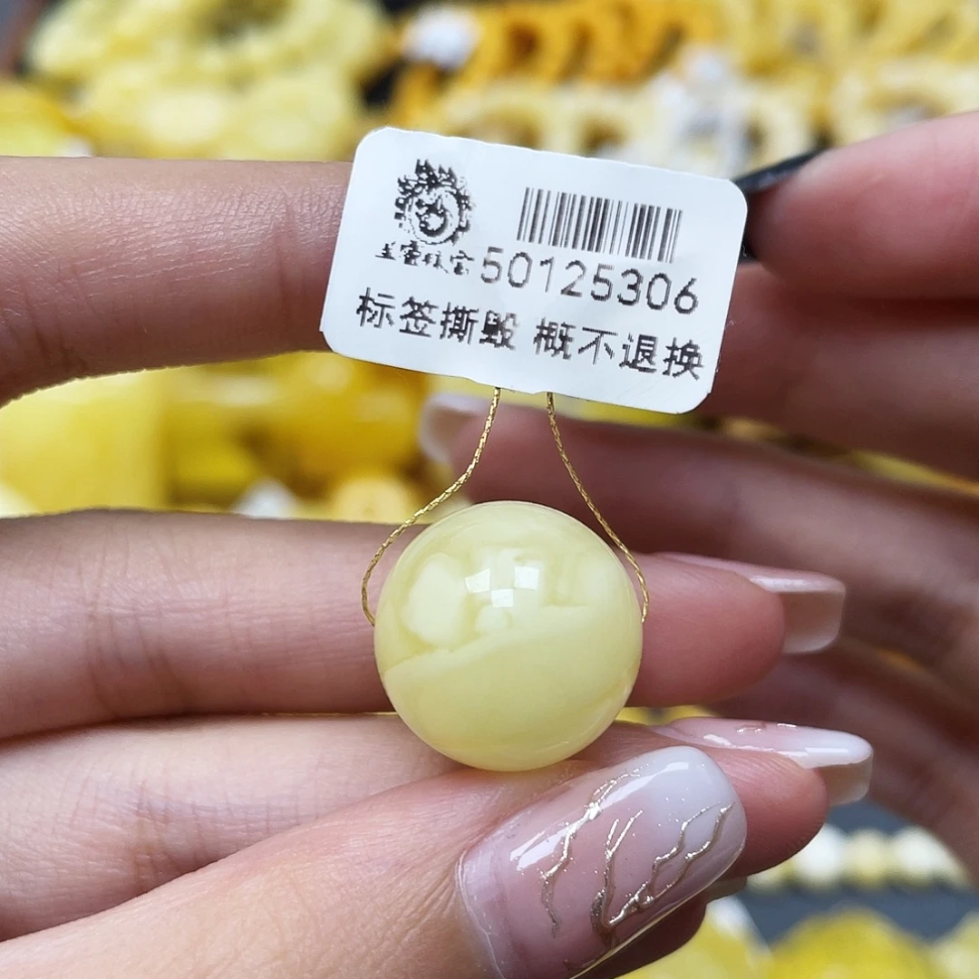 琥珀未镶嵌裸石16.9mm浓白妖花蜜蜡