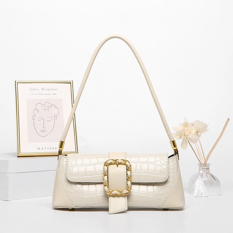 拉链搭扣纯色单肩手提式腋下包车缝线欧美防刮铆钉