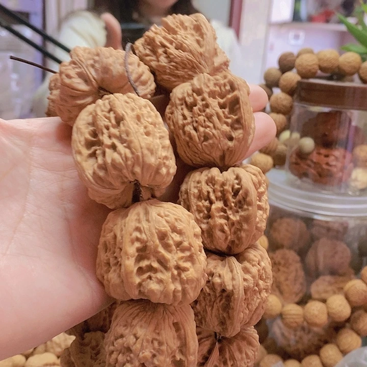【闪购商品】文玩核桃把件L***u平谷凹底2条手持