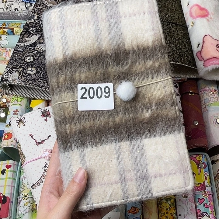 织绣A5s活页送纸2009