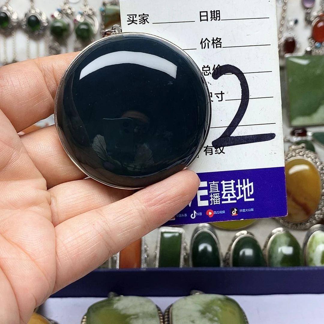 一***埃银S925镶嵌蛇纹石玉吊坠