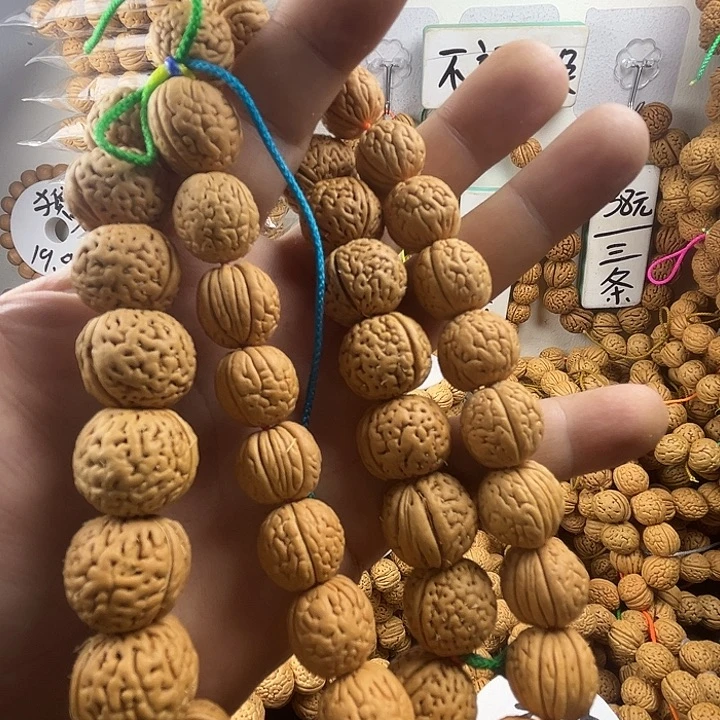 人***乐吊坠桃核桃核的大小可以调节其