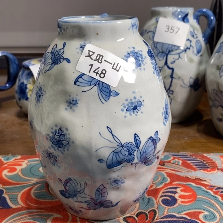 芹***️钛合金景德镇手绘蝴蝶花插